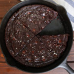 Dark chocolate cake in cast iron skillet