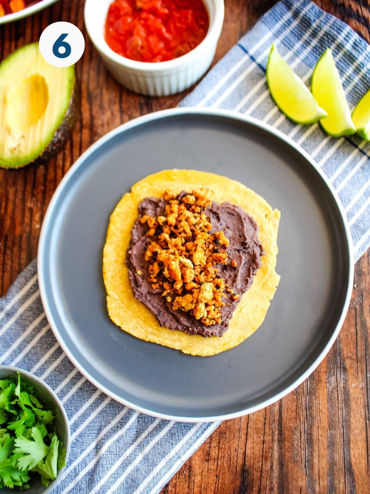 Tempeh chorizo added on top of the beans to make tacos.