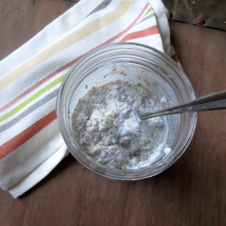 a spoon in a jar full of chia seed oats