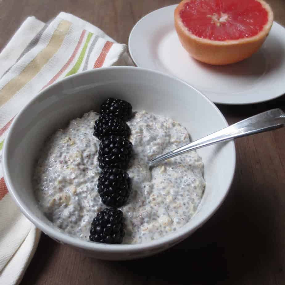 overnight oats with chia seeds and blackberries on top