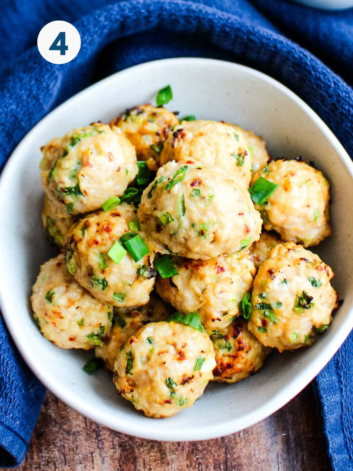 Cooked Japanese meatballs in a bowl on the table.