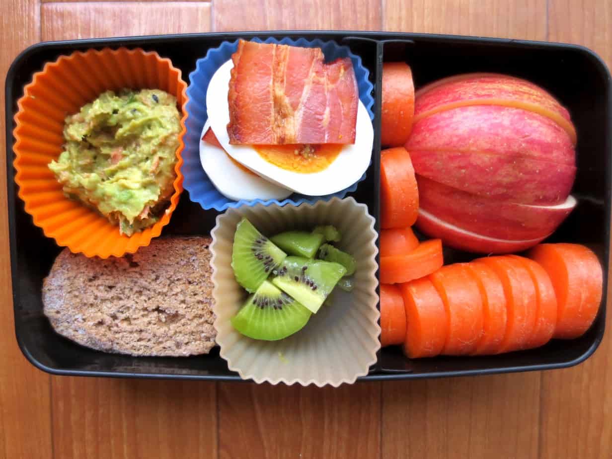 Bento Box with Hard Boiled Eggs, Salmon-Avocado, Whole Wheat Banana Bread, Apples, Carrots