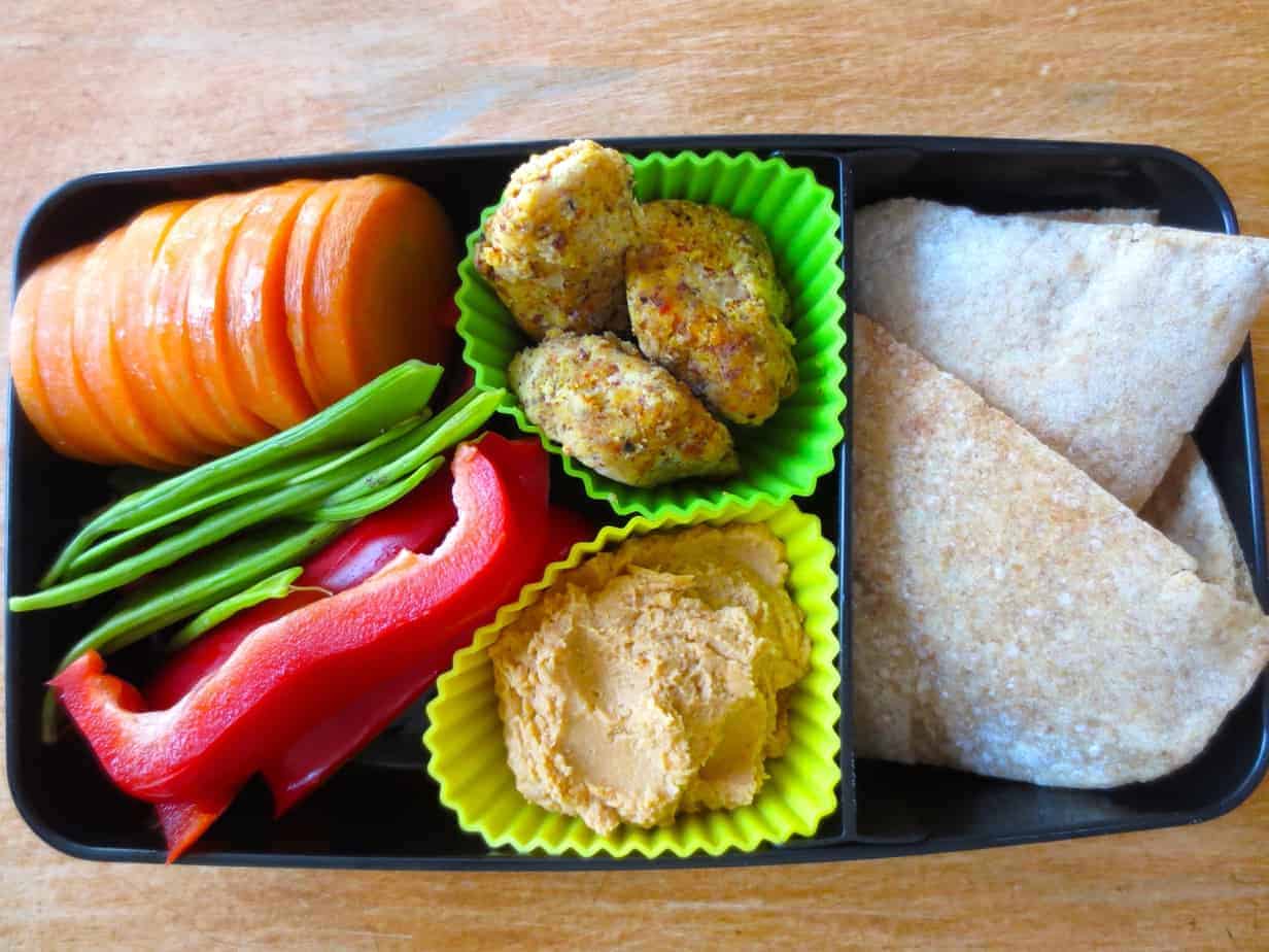 Hummus & Dippers Bento Box with veggies, chicken nuggets, and pizza dough