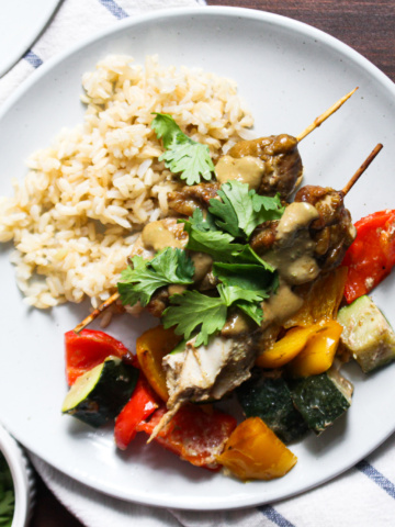 Plate of chicken, vegetables, and rice