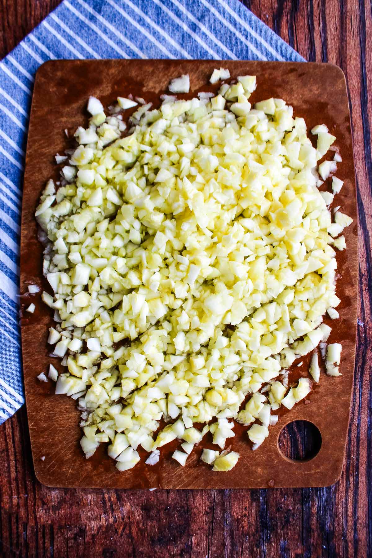 Zucchini chopped on a cutting board.