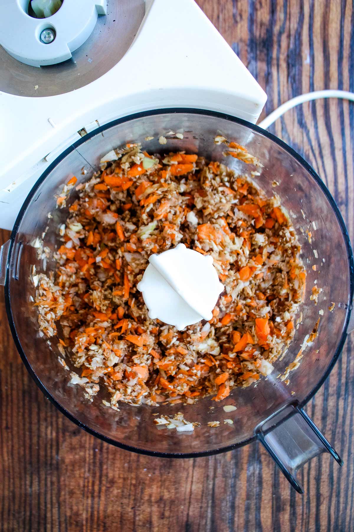 Vegetables chopped in the food processor bowl.