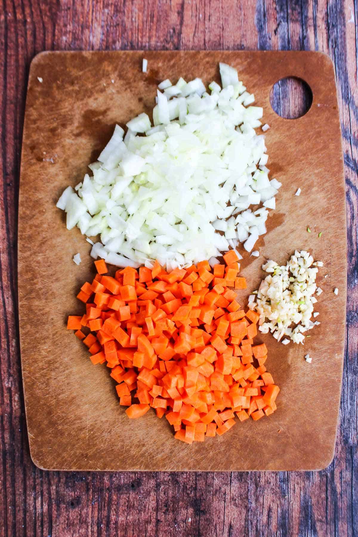 Chopped veggies for the soup on a cutting board.