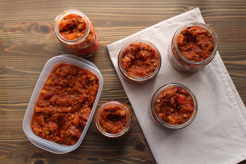 Sweet Potato Turkey Chili with Pumpkin Pie Spice in containers for freezing. | Frugal Nutrition