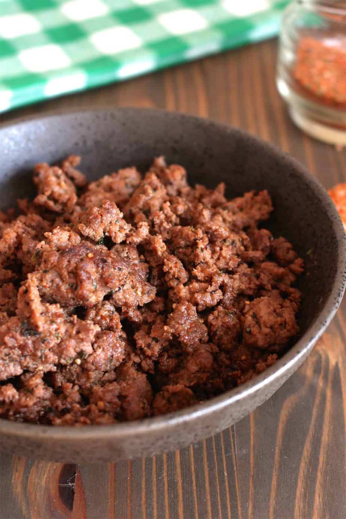 Homemade italian sausage cooked in a pan.