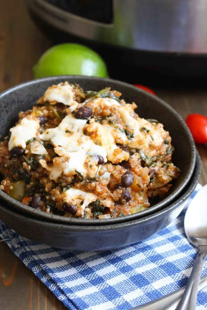Quinoa Enchilada Casserole with black beans, peppers, tomatoes, spinach, and queso fresco | Frugal Nutrition
