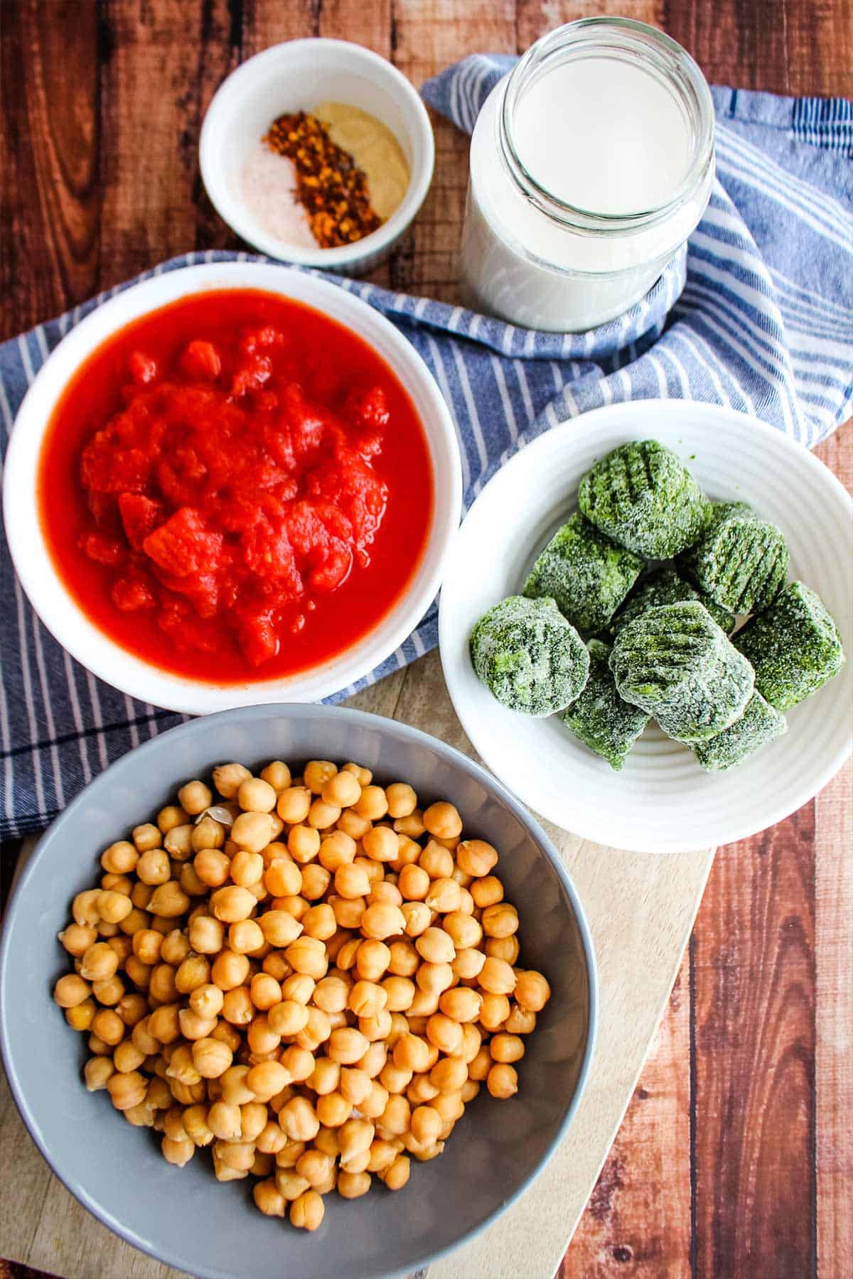 Ingredients to make vegan chickpea recipe on the table.