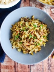 Cooked ground beef and cabbage recipe served in a bowl.