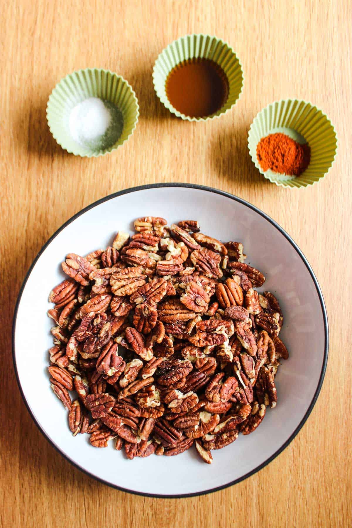 Ingredients needed to make spicy candied pecans.