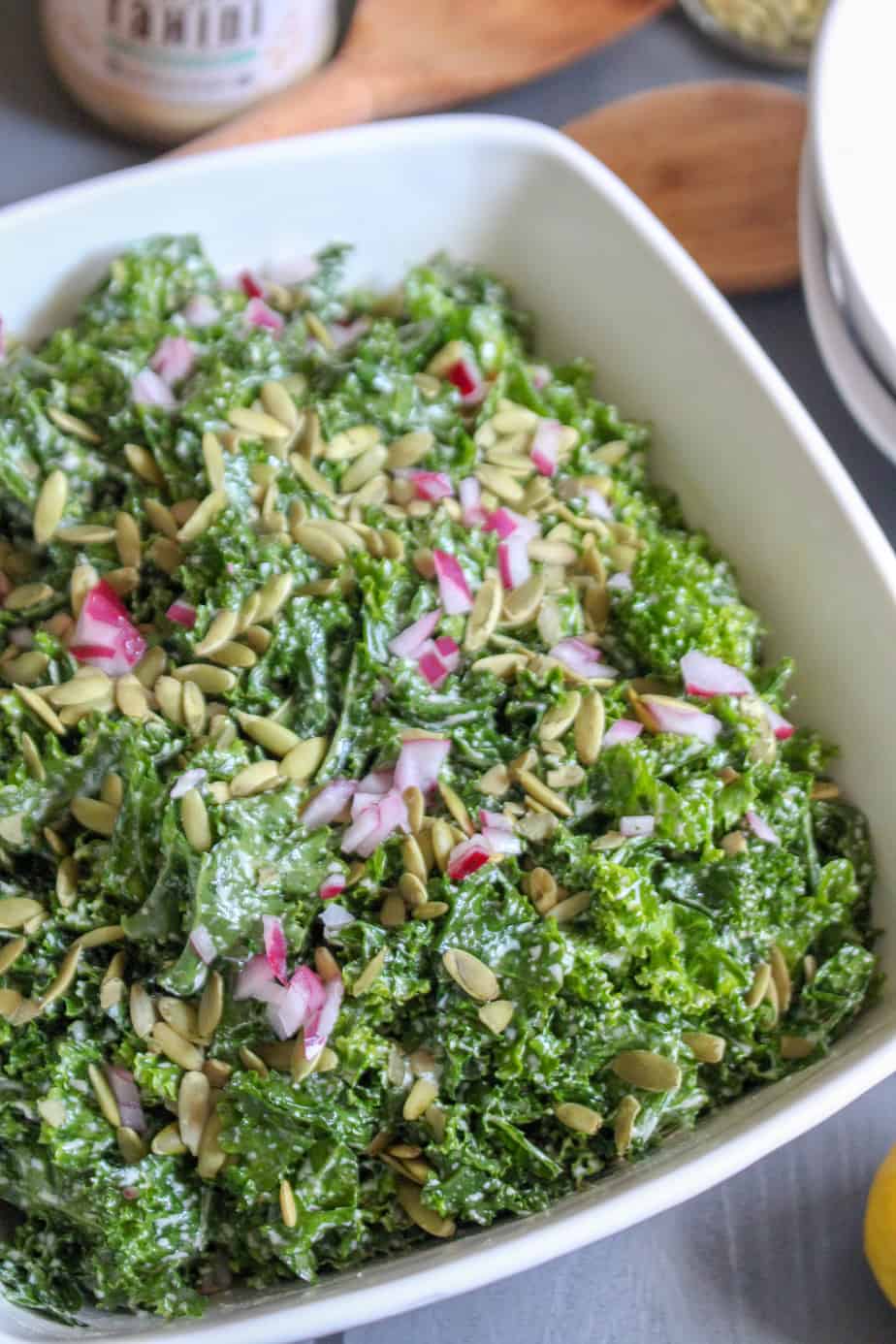 Easy Massaged Kale Salad with Lemon Tahini Dressing and Pumpkin Seeds | Frugal Nutrition