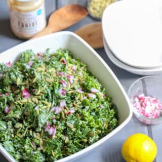 Massaged Kale and Tahini Salad with Pumpkin Seeds | Frugal Nutrition | www.frugalnutrition.com #kalesalad