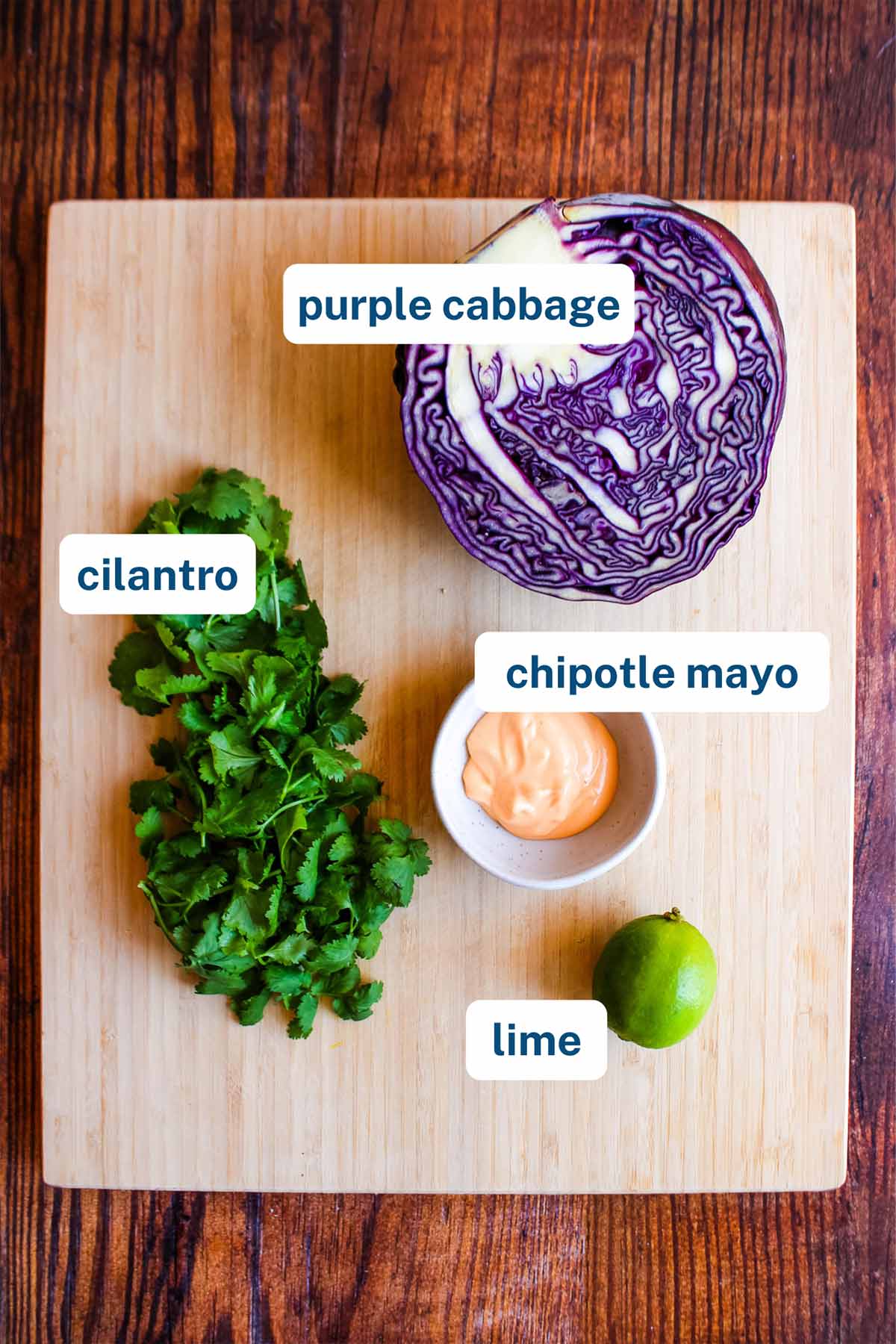 Ingredients to make red cabbage slaw on the table.