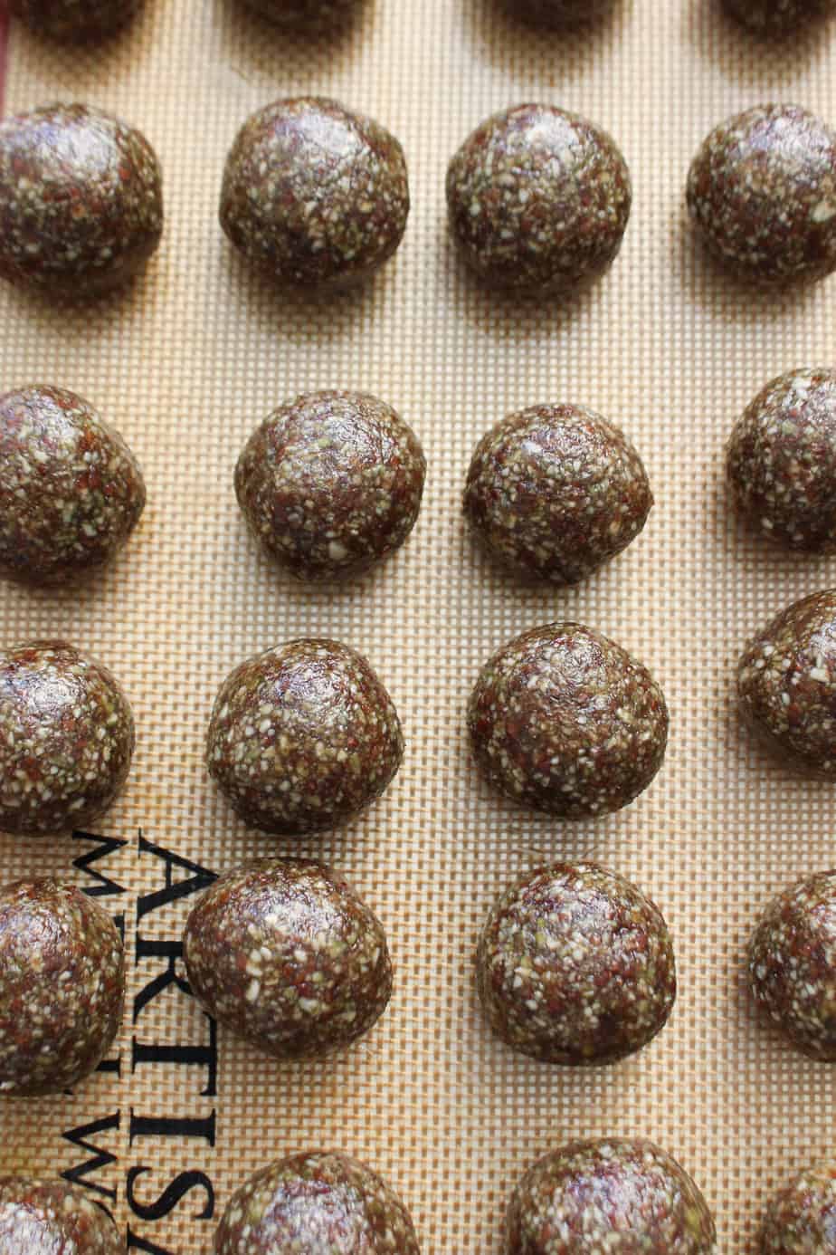 Pumpkin and Flaxseed Bites rolled into spheres