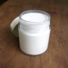 homemade creamy coconut milk in a jar