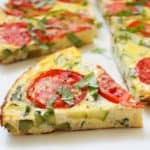 slice of a tomato and zucchini frittata