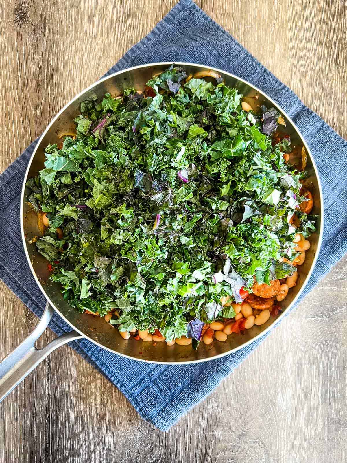 Kale is added on top.