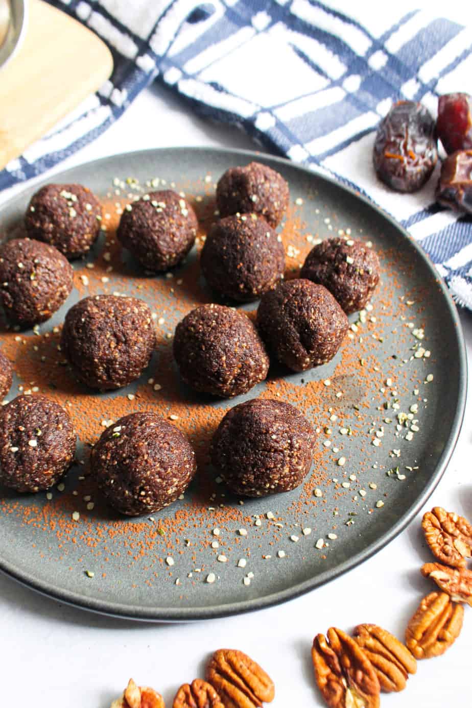 slate colored plate with dark chocolate truffles