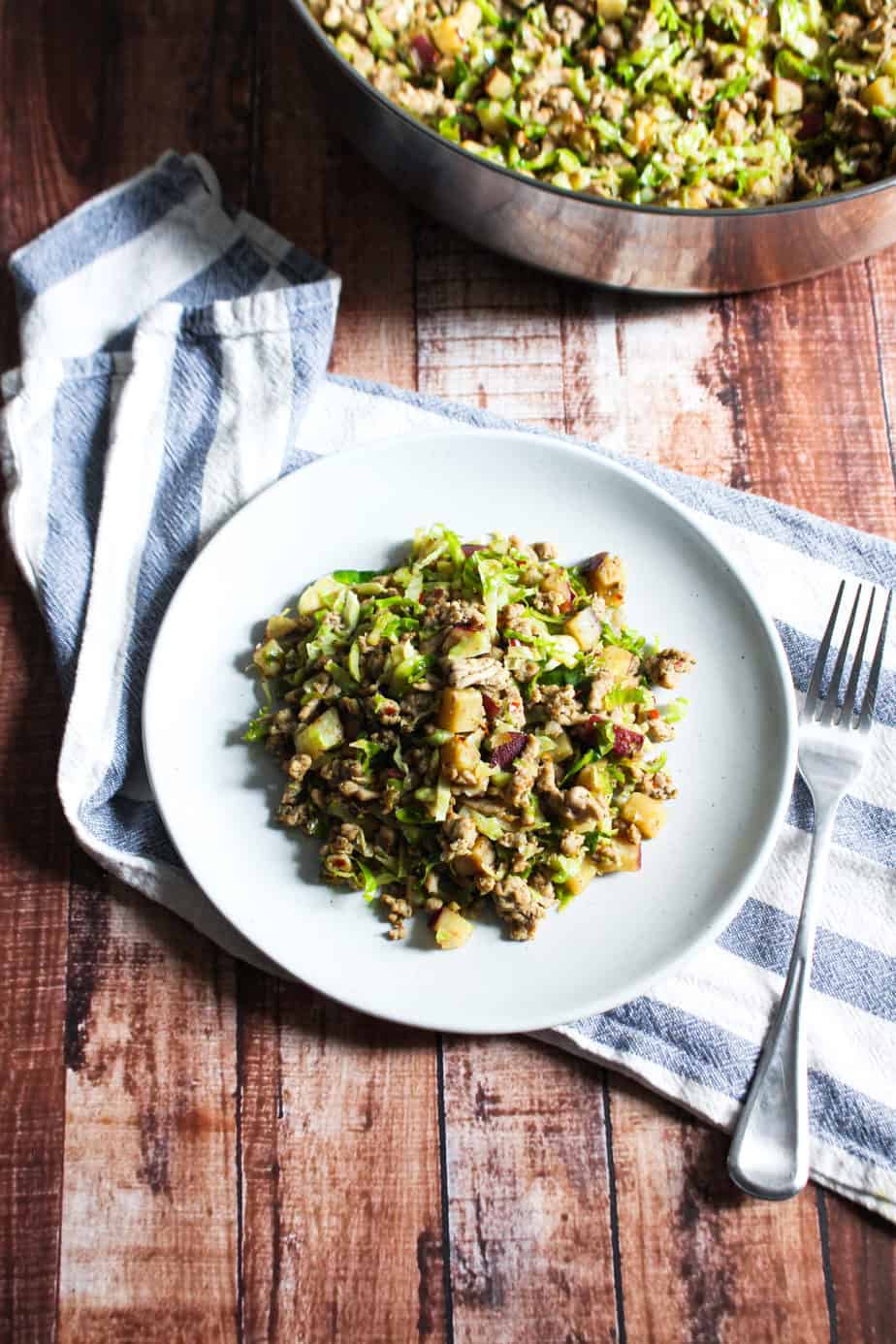 white plate with turkey breakfast hash