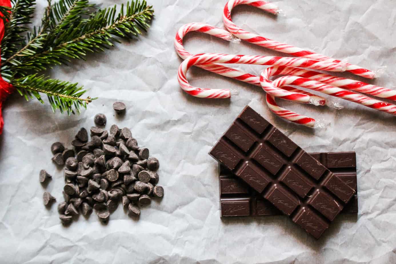 ingredients: candy canes, chocolate chips or bar, on parchment paper