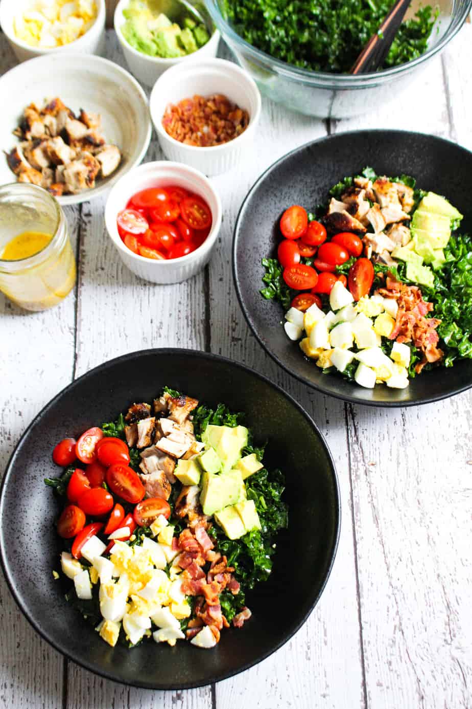 two bowls with kale cobb salad