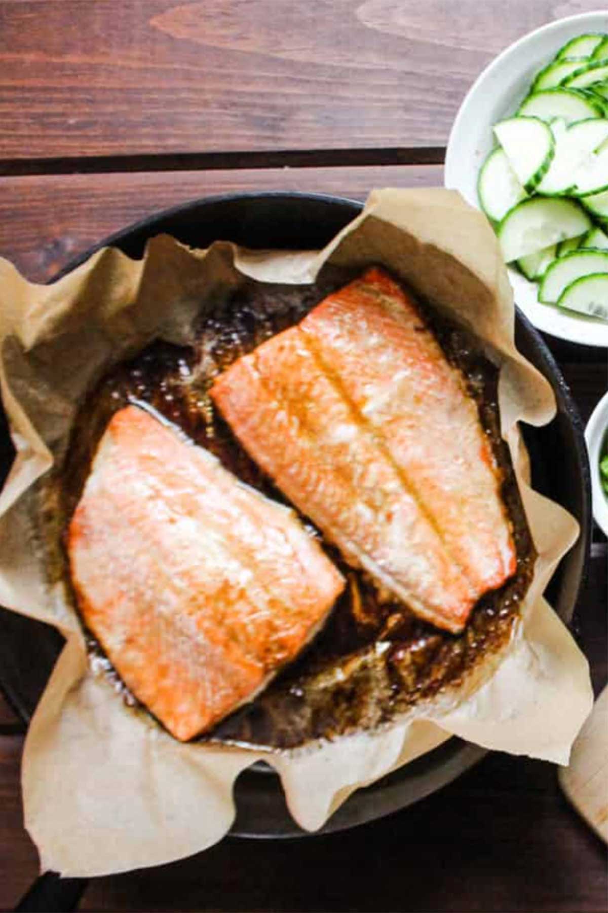 Salmon cooked in a pan.