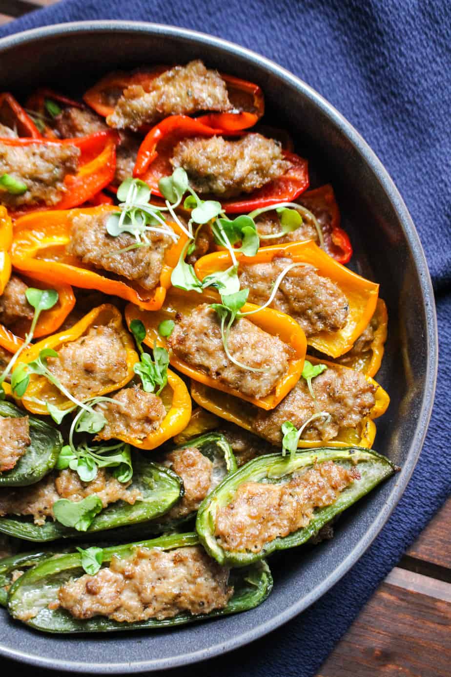 bowl with colorful sausage stuffed mini peppers