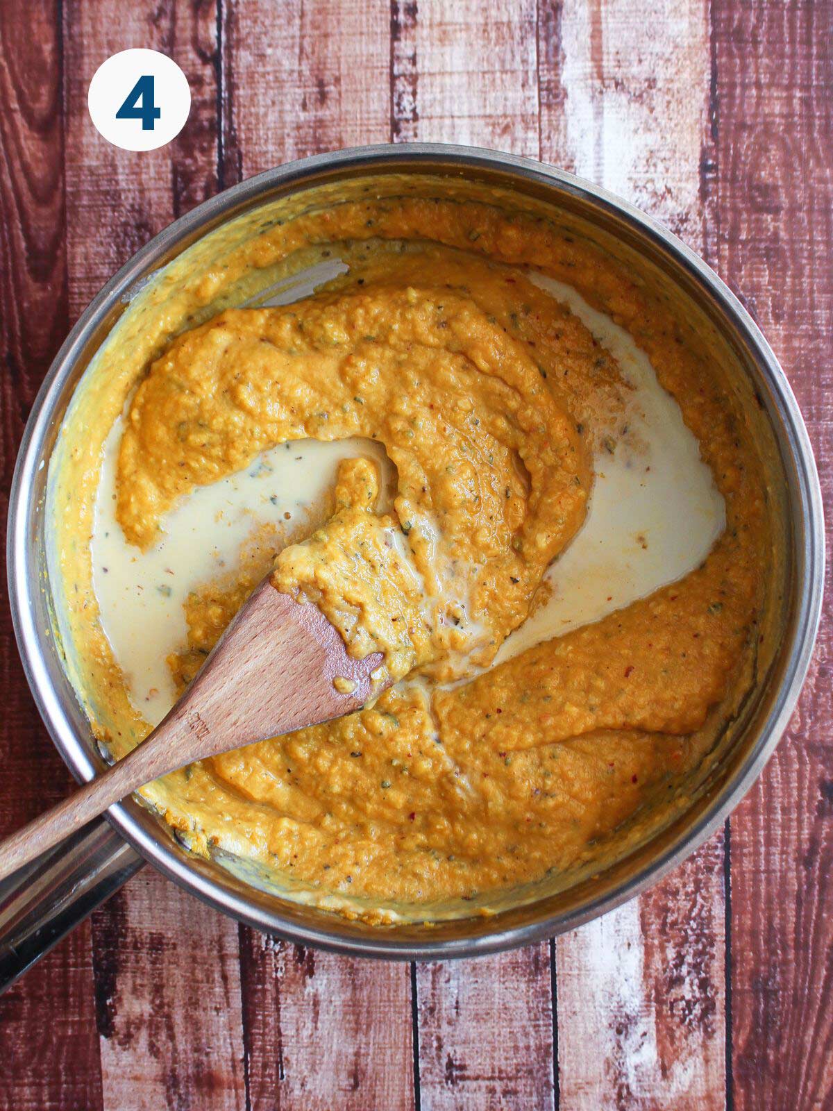 Pumpkin pasta sauce after adding the milk.