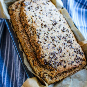 Slices of buckwheat bread on a cutting board.
