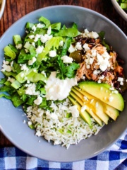 A slow cooker chicken burrito bowl on the table ready to eat!