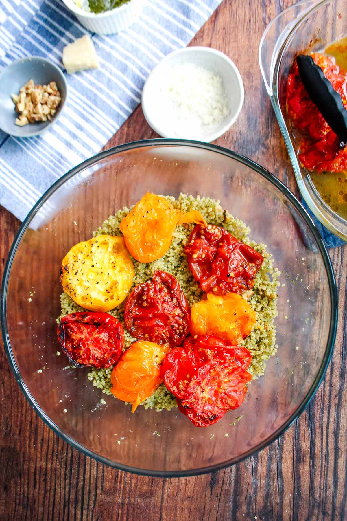 Roasted tomatoes on top of pesto and quinoa.