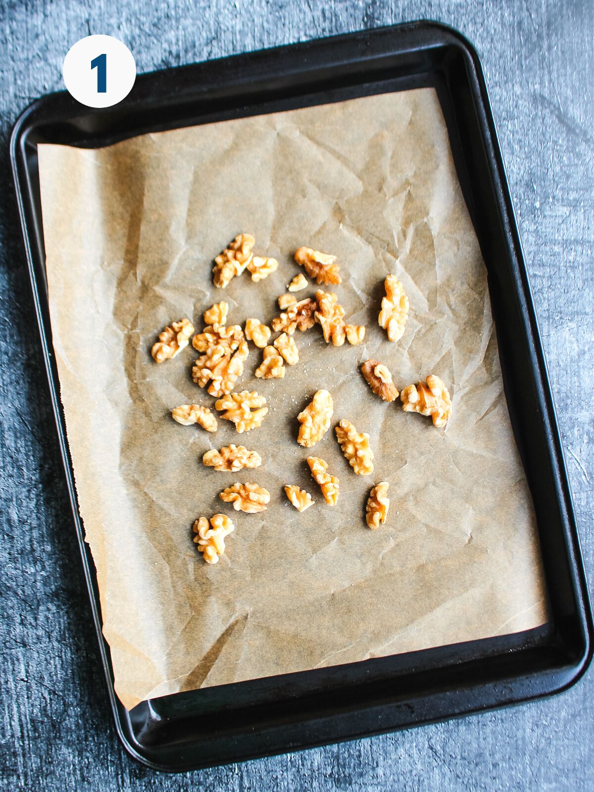 Nuts on a baking tray.
