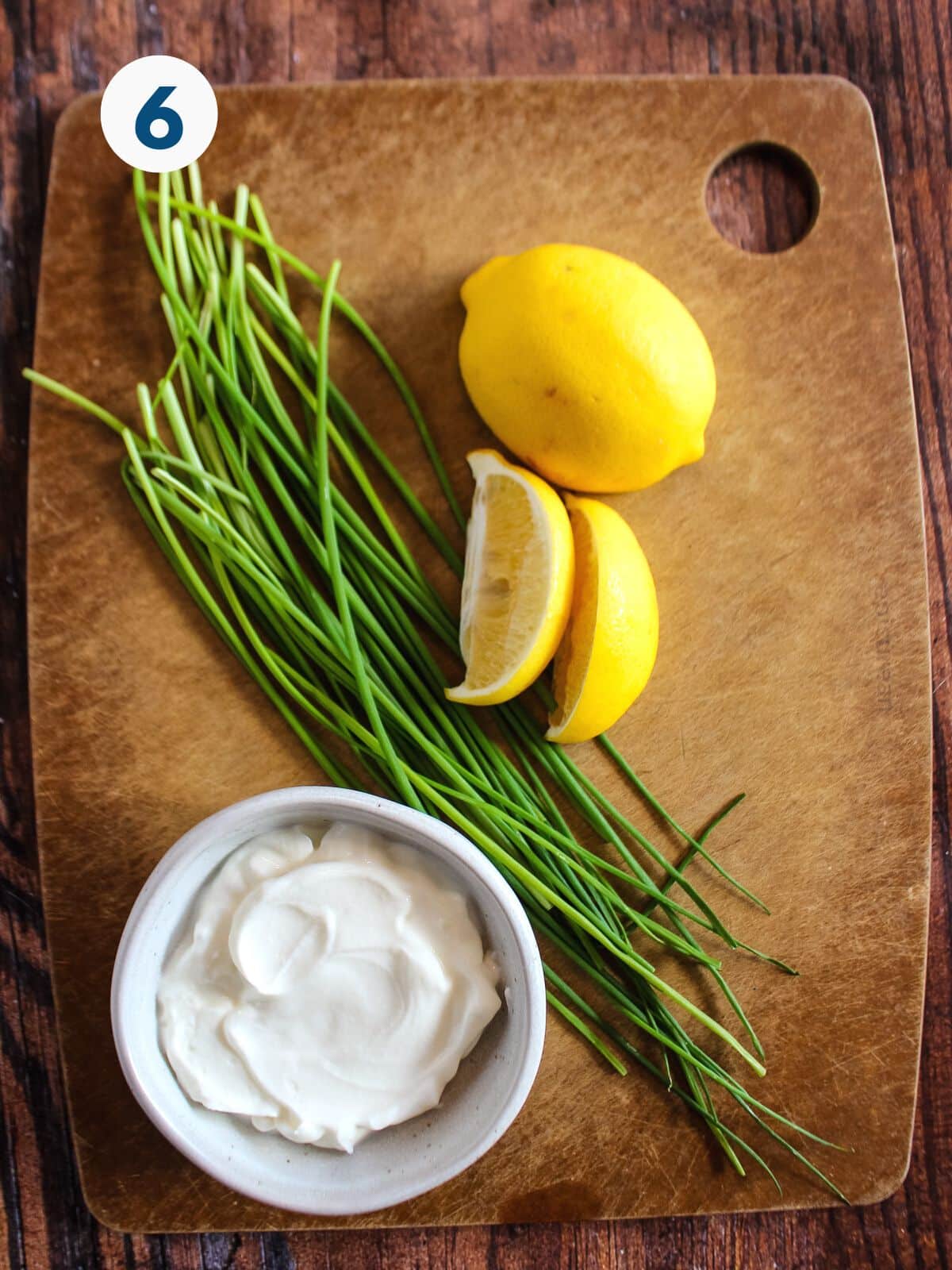 The ingredients to make the creamy sauce on a cutting board.