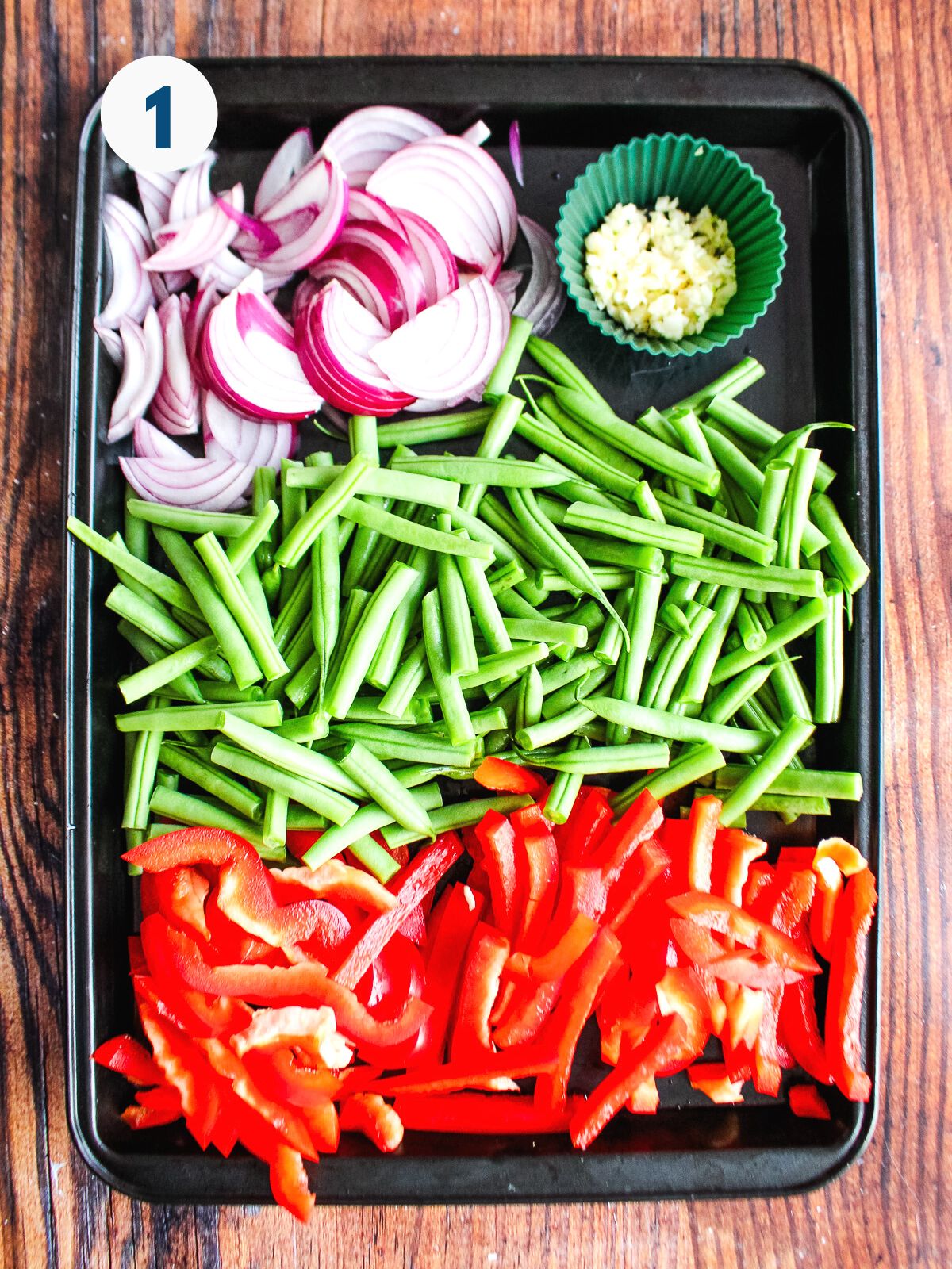 Vegetables cooking on a pan.