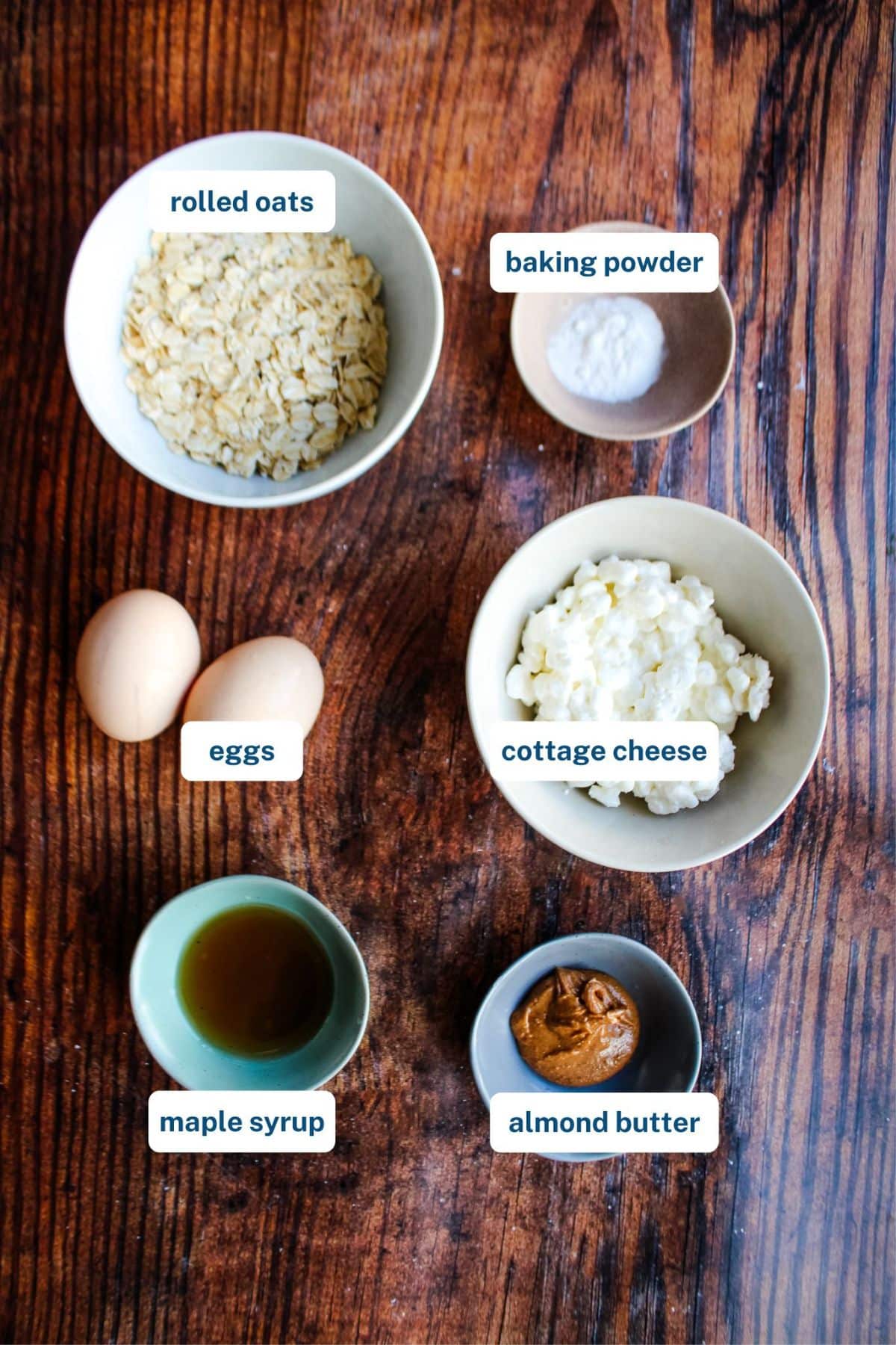 Ingredients to make cottage cheese pancake on the table before mixing.