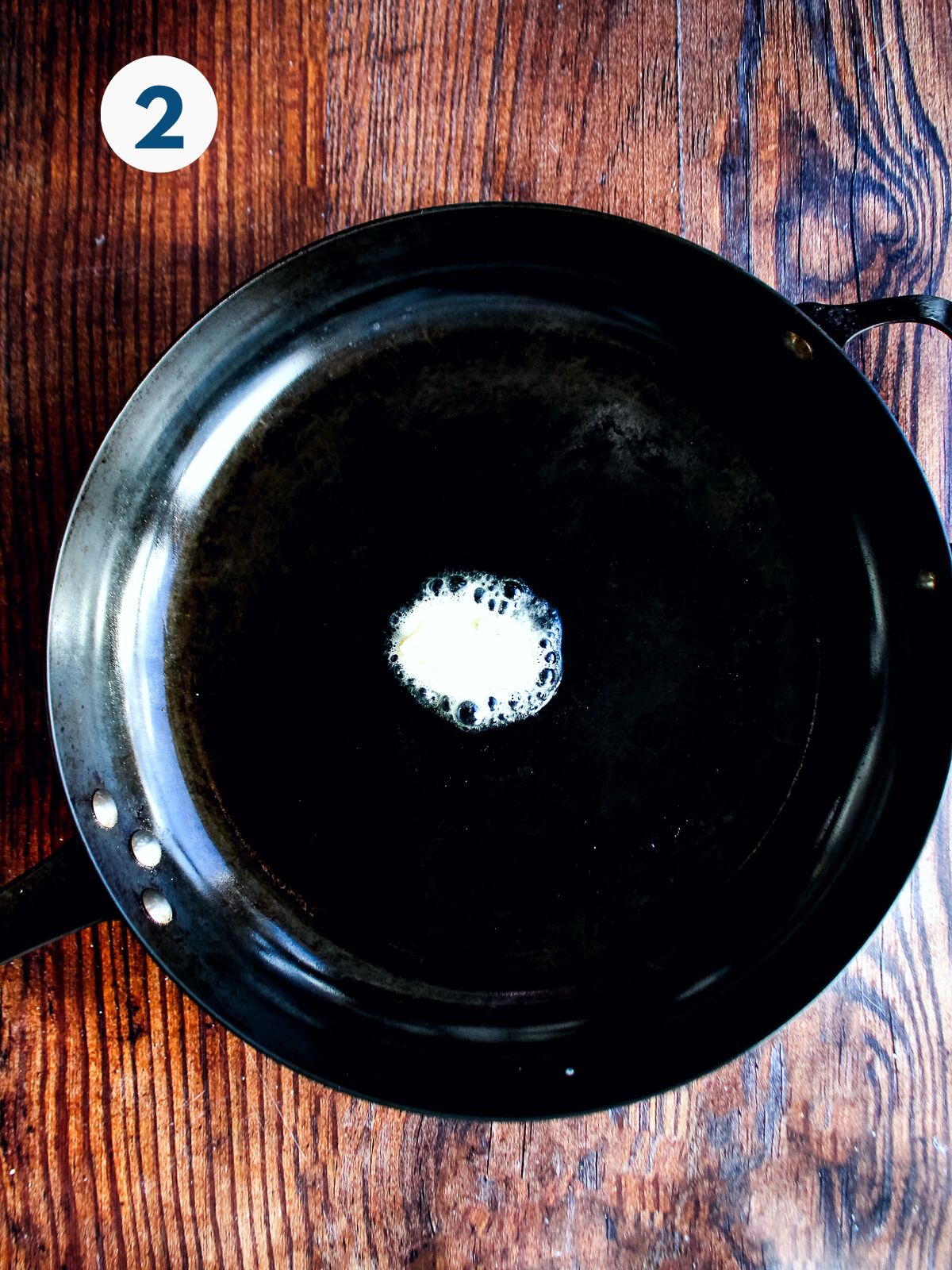 Butter in a skillet.