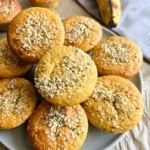 Almond flour banana muffins on a plate ready to eat.