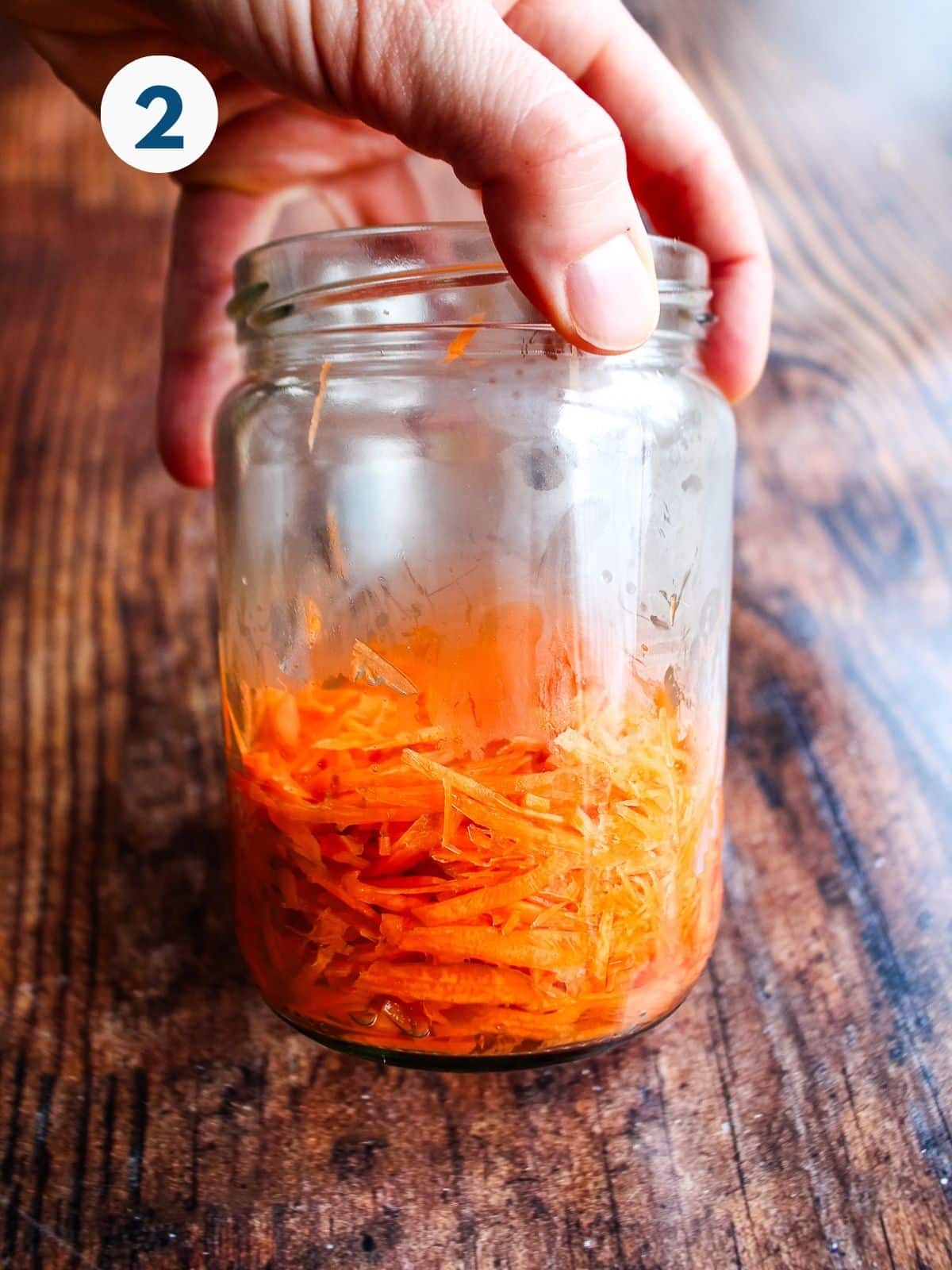 Pickled carrots in a jar.