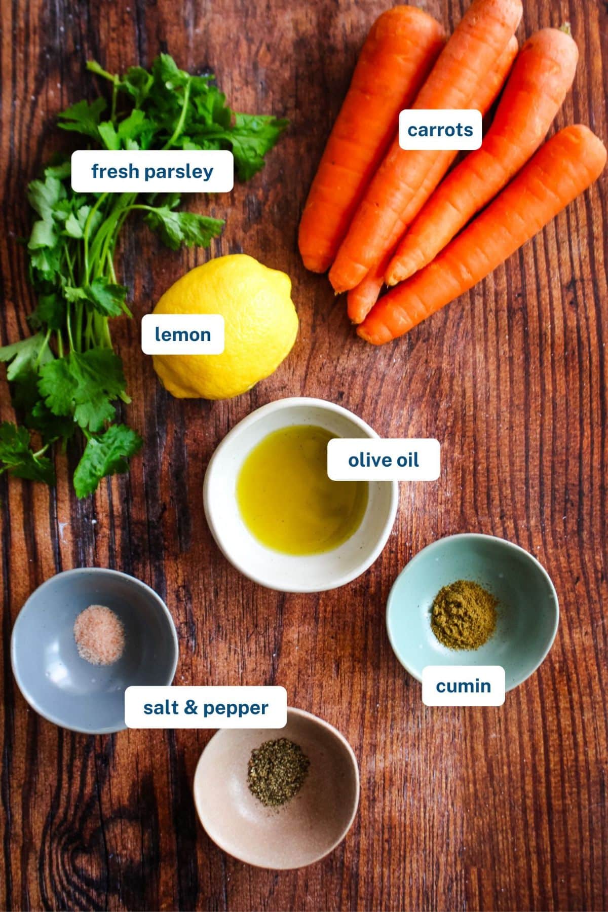 Ingredients to make carrot salad on the table before mixing.