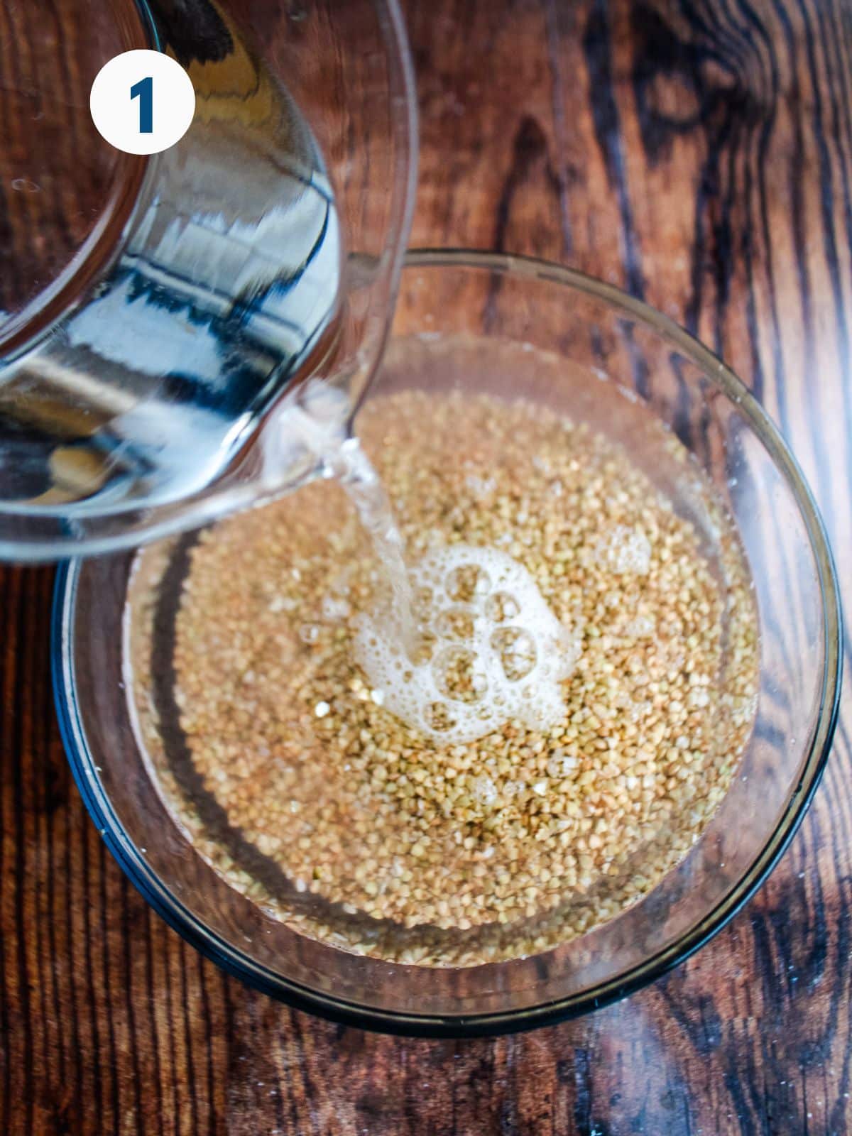 Pouring hot water over buckwheat groats.