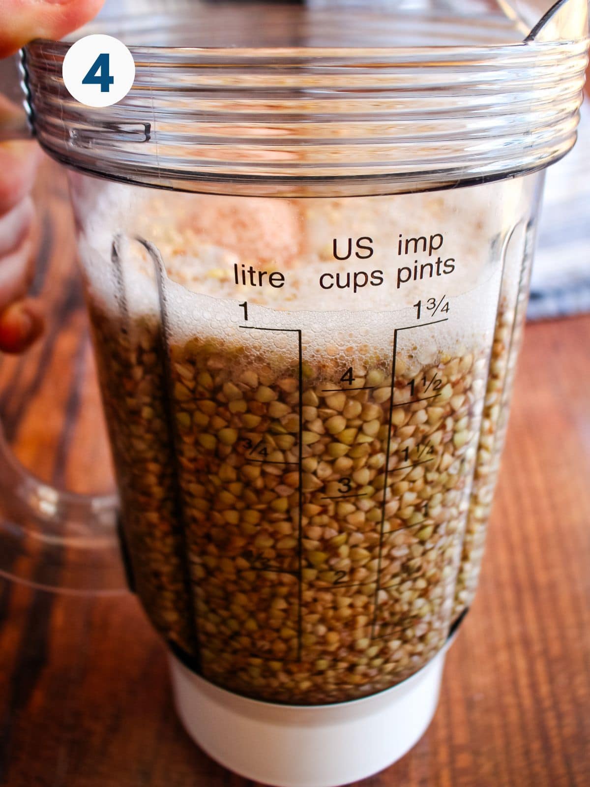 Water and buckwheat groats added to a blender.