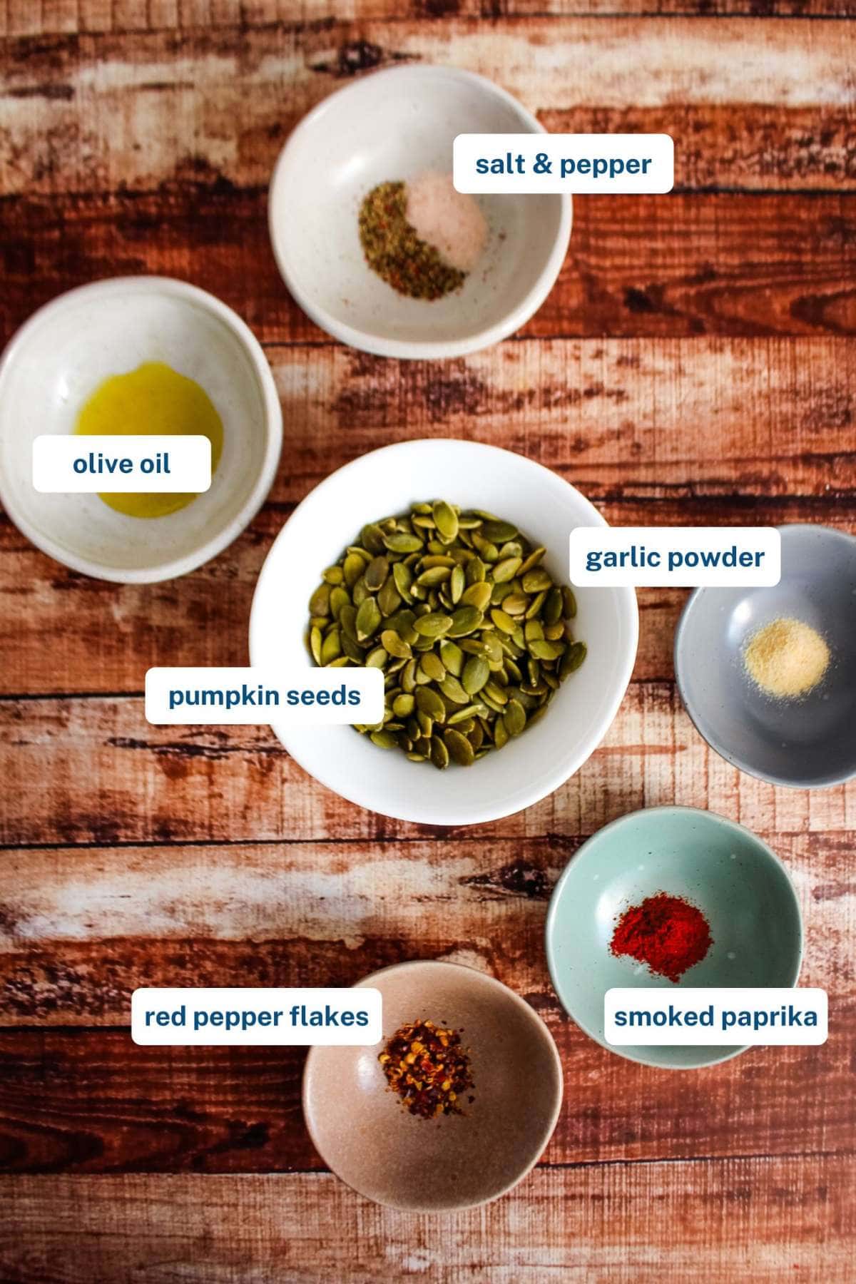 Ingredients to make spiced pumpkin seeds on the table before preparing.